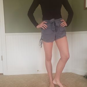 Booty Shorts with lace, ties and deep pockets.